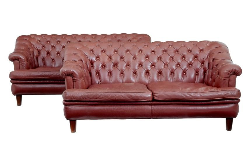 PAIR OF MID 20TH CENTURY RED LEATHER CHESTERFIELD SOFAS