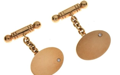 Pair of 9ct gold cufflinks, the plain oval panel...