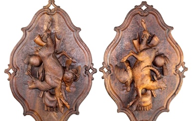 Pair of French Black Forest carved walnut trophy plaques