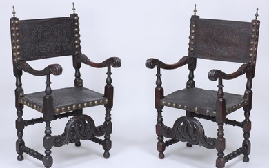 Pair of Iberian Carved Walnut and Tooled Leather Armchairs