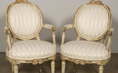 Pair of Louis XVI French Carved Open Arm Fauteuils