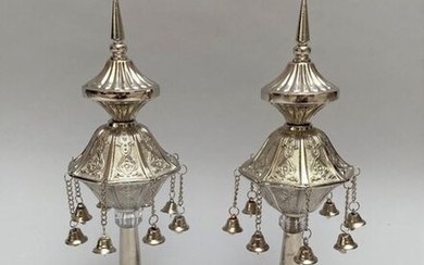 Pair of Rimonim with chiselled silver plated metal bells.