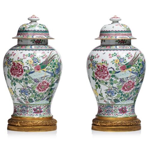 Pair of baluster-shaped covered porcelain vases with polychrome decoration in...