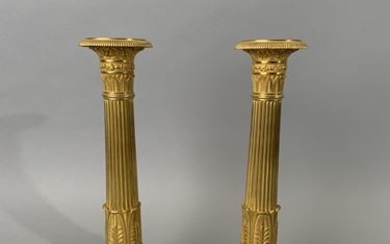 Pair of gilt and chased bronze torches decorated...