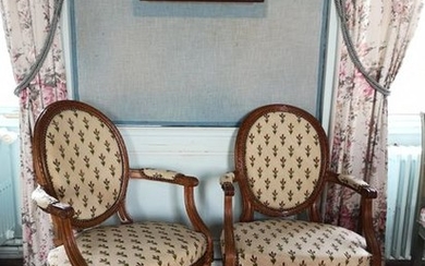 Pair of medallion armchairs in natural wood with...