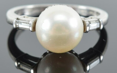 Platinum and pearl diamond mounted ring. Pearl measures
