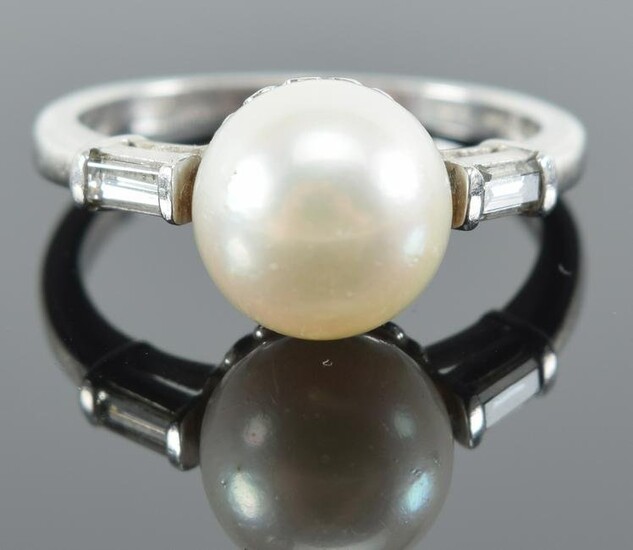 Platinum and pearl diamond mounted ring. Pearl measures