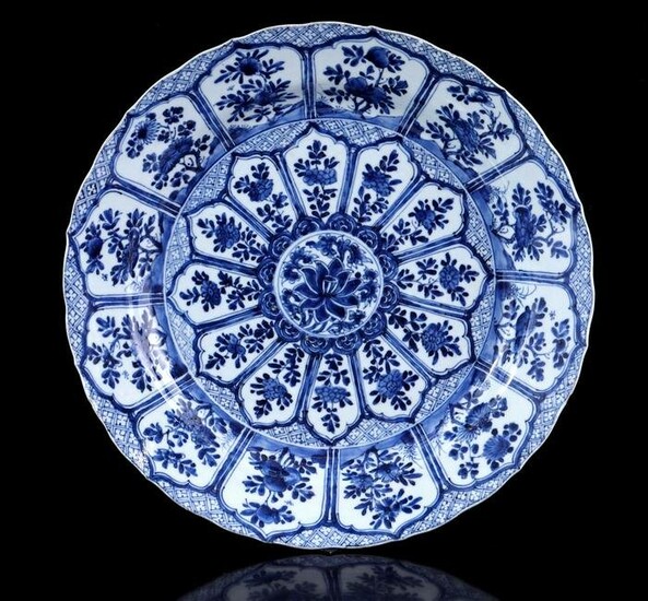 Porcelain dish with contoured edge and blue and white