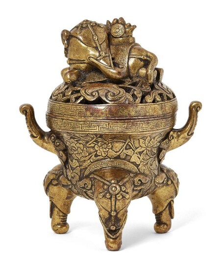 Property of a Gentleman (lots 36-85) A Chinese gilt-bronze 'elephant' tripod censer and cover, Xuande mark, 18th century, the cover surmounted with recumbent elephant and pierced with lingzhi sprigs above a Greek key border, the base with two...
