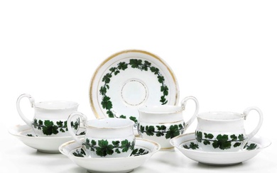 Quattro tazze con piattino. Meissen, XIX secolo.
