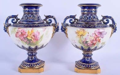 Royal Worcester pair of vases with face mask handles