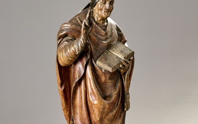 "Saint évêque au livre". Sujet en bois sculpté polychromé. XVIIème siècle. 139 x 47 cm....