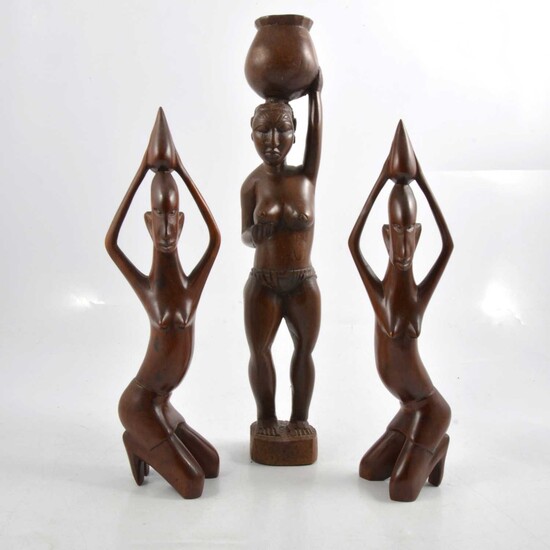 Small collection of African carved wood artifacts.