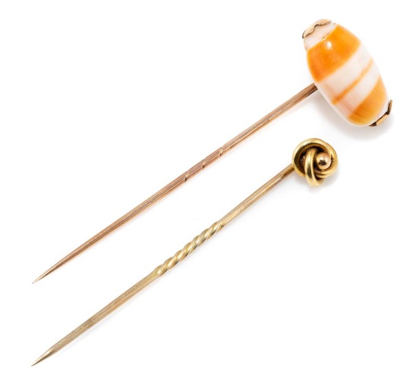 TWO ANTIQUE 15CT GOLD STICKPINS; one set with shell, in box, the other a knot design, total wt.4.46g.