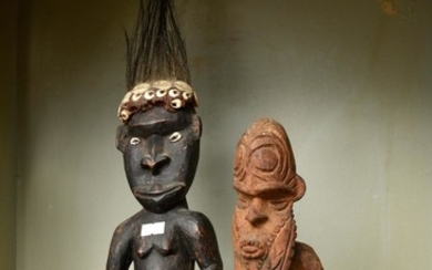 TWO CARVED FIGURES, POSSIBLY NEW GUINEAN