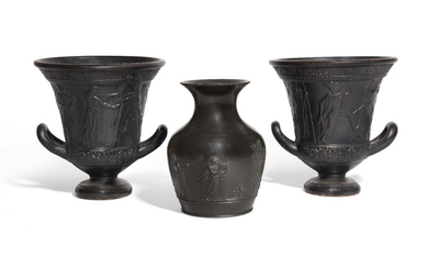 Three decorative black glazed vessels, including two kraters, with moulded decoration, 16.9cm. high and a jar with moulded decoration, 14.7cm high (3) Provenance: Private London collection formed between the 1980s-1990s.