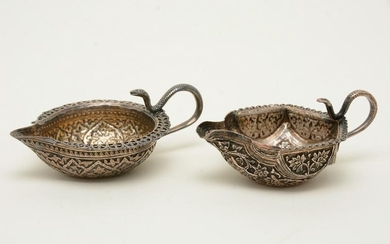 Two Southeast Asian silver lamps with repousse