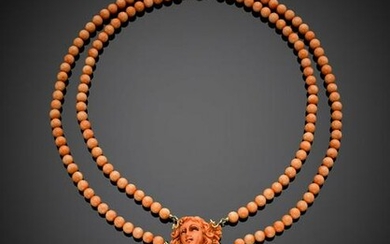Two strand pink orangish coral bead necklace with
