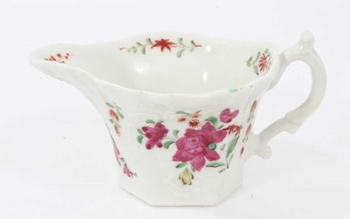 Worcester cream boat, circa 1760, with hexagonal base, polychrome painted with flowers in the famille rose style, 5.75cm high