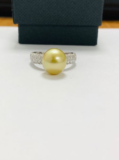 14ct white gold pearl & diamond ring. featuring...