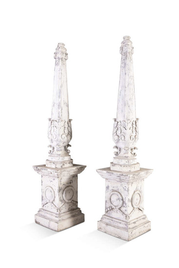 A PAIR OF PAINTED AND CARVED TIMBER OBELISKS,...