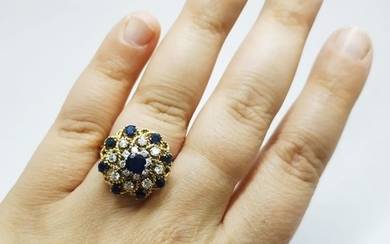 18k gold diamond and sapphire cluster ring.