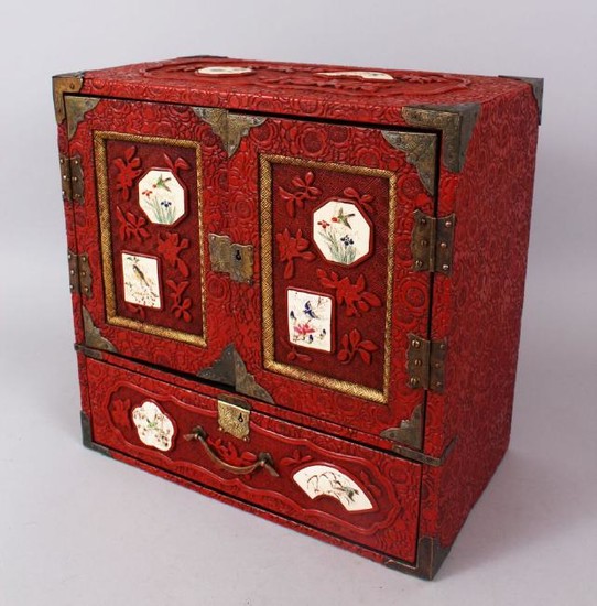 AN UNUSUAL JAPANESE CINNABAR LACQUER TABLE CABINET WITH