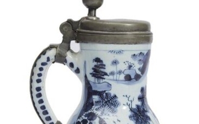 51-DELFT: Earthenware TANKARD with blue Chinese decoration in a landscape....
