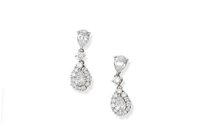 A pair of diamond pendent earrings