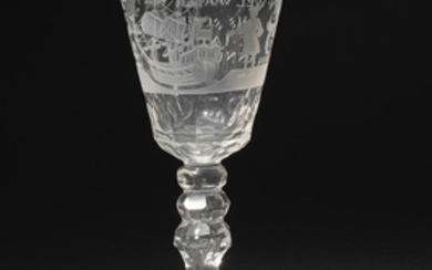 A Dutch or German faceted wine glass, dated 1761