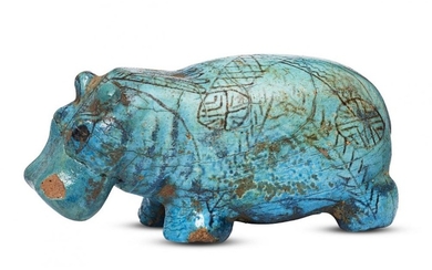 An Egyptian turquoise glazed composition hippopotamus, Second...
