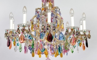 A glass chandelier with semi-precious stones