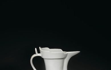 A RARE INSCRIBED WHITE 'MONK'S CAP' EWER, YONGLE PERIOD (1403-1424)
