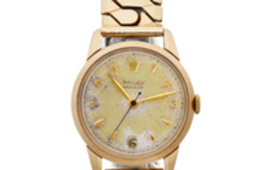 Rolex. A 9K gold manual wind bracelet watch