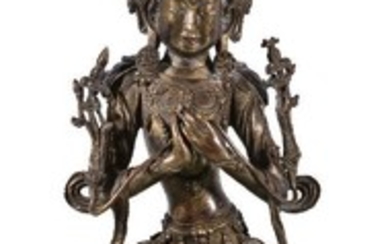 A Sino-Tibetan gilt- bronze figure of Manjusri