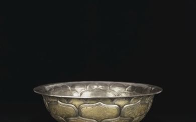 A VERY RARE AND IMPORTANT LARGE PARCEL-GILT SILVER BOWL, TANG DYNASTY (AD 618-907)