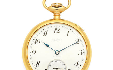 Patek Philippe Retailed by Tiffany. An 18K gold key wind open face pocket watch