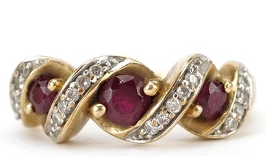 9ct gold diamond and ruby crossover ring, total diamond weig...
