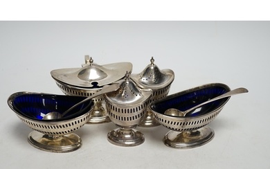 A 1930's George III style five piece silver cruet set, Londo...