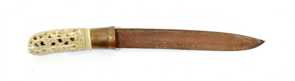 A 19th Century Burmese Knife, the 21.5cm single edge steel...