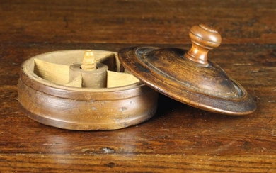 A 19th Century French Turned Treen Spice Box, Circa 1830. The round moulded top centred by a knob ha