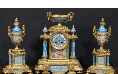 A 19th century French ormolu and porcelain clock garniature,...