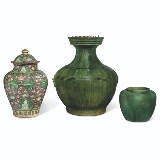 A CHINESE GREEN-GLAZED POTTERY HU VASE, A CHINESE FAMILLE VERTE ON-BISCUIT VASE AND COVER, AND A CHINESE APPLE GREEN-GLAZED JAR
