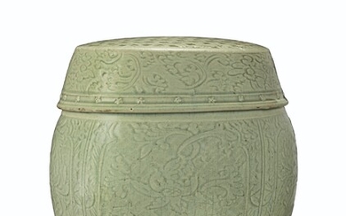 A CHINESE LONGQUAN CELADON CARVED GARDEN SEAT, MING DYNASTY (1368-1644)