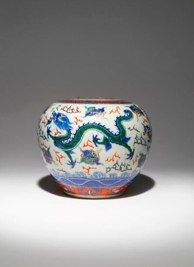 A CHINESE WUCAI 'DRAGON' VASE 19TH CENTURY The ovoid body...