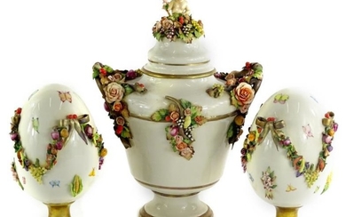 A Capodimonte porcelain garniture, the central two handled urn...