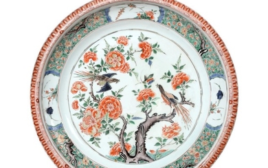 A Chinese Porcelain Charger, Kangxi, painted in famille verte enamels...
