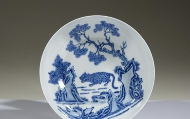 A Chinese blue and white porcelain "Tiger" dish, Qing