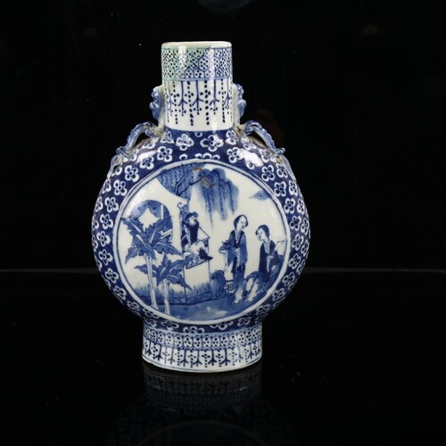 A Chinese blue and white porcelain moon-shaped vase with pai...