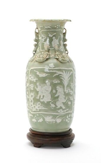 A Chinese celadon and bianco sopra bianco baluster porcelain vase, late Qing - early Republic. H. 45 cm.